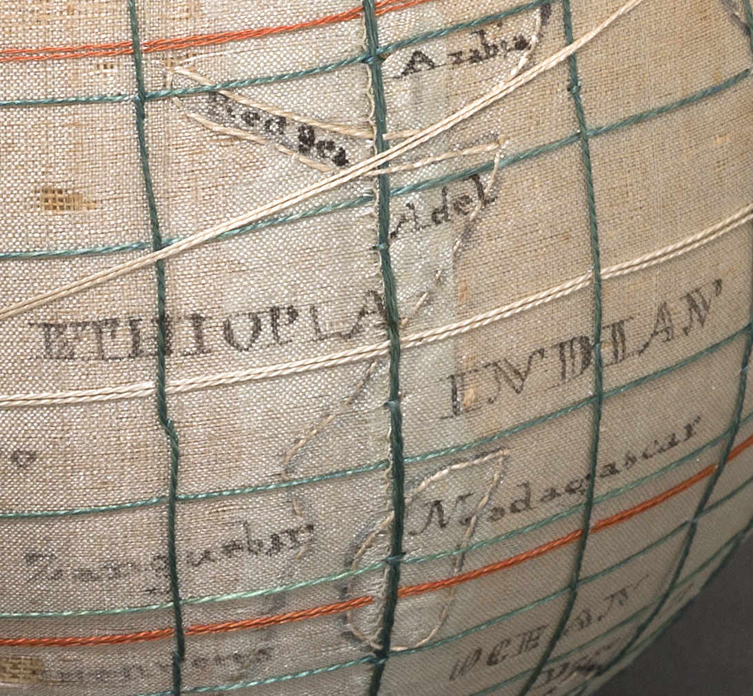 Close up image of globe or terrestrial sampler